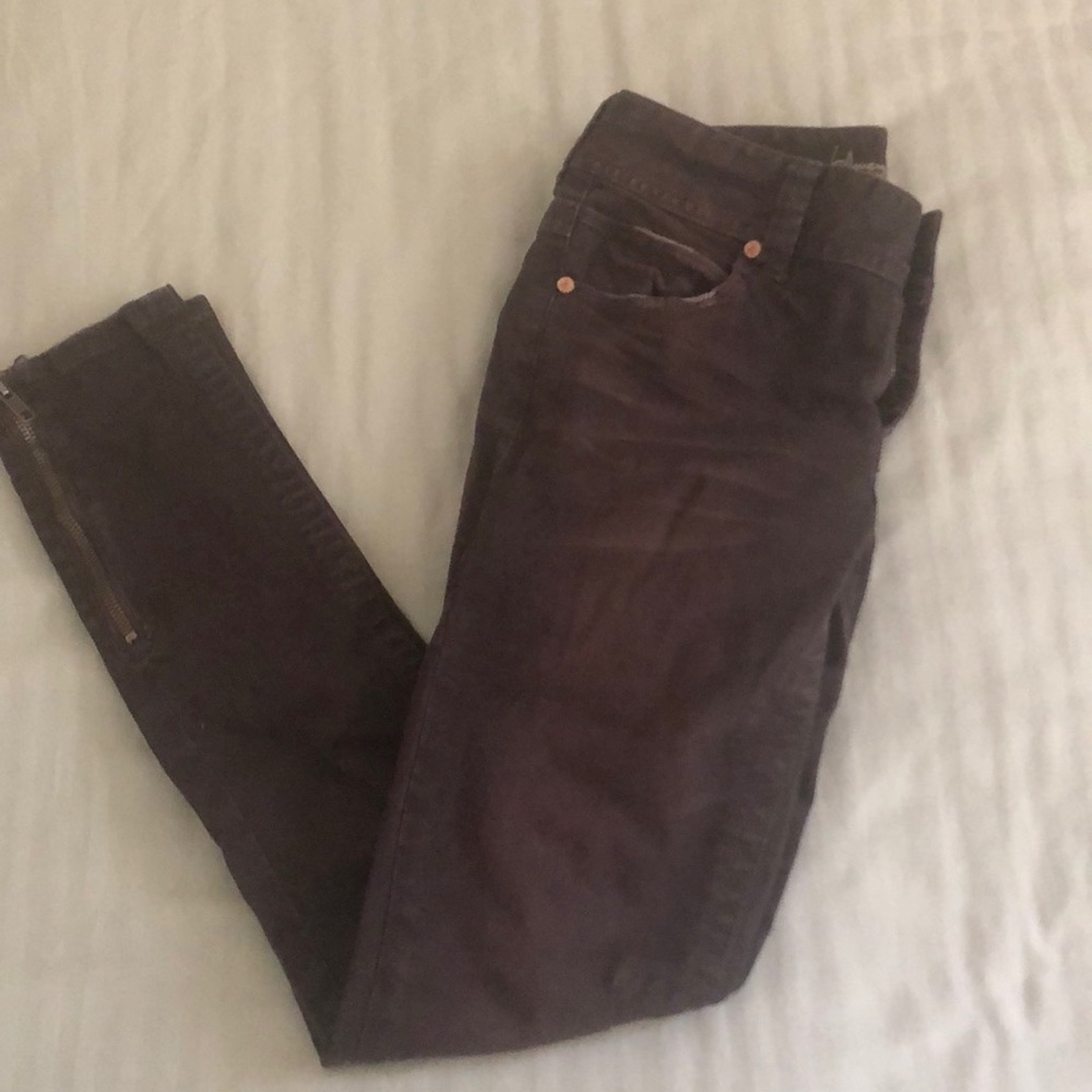 Brown American Rag “super skinny” jeans.
